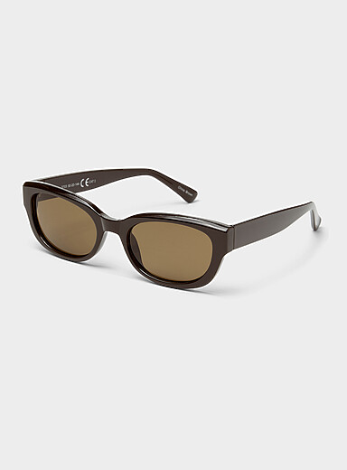Les lunettes de soleil ovales translucides unies
