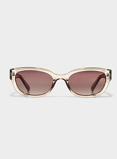 Les lunettes de soleil ovales translucides unies