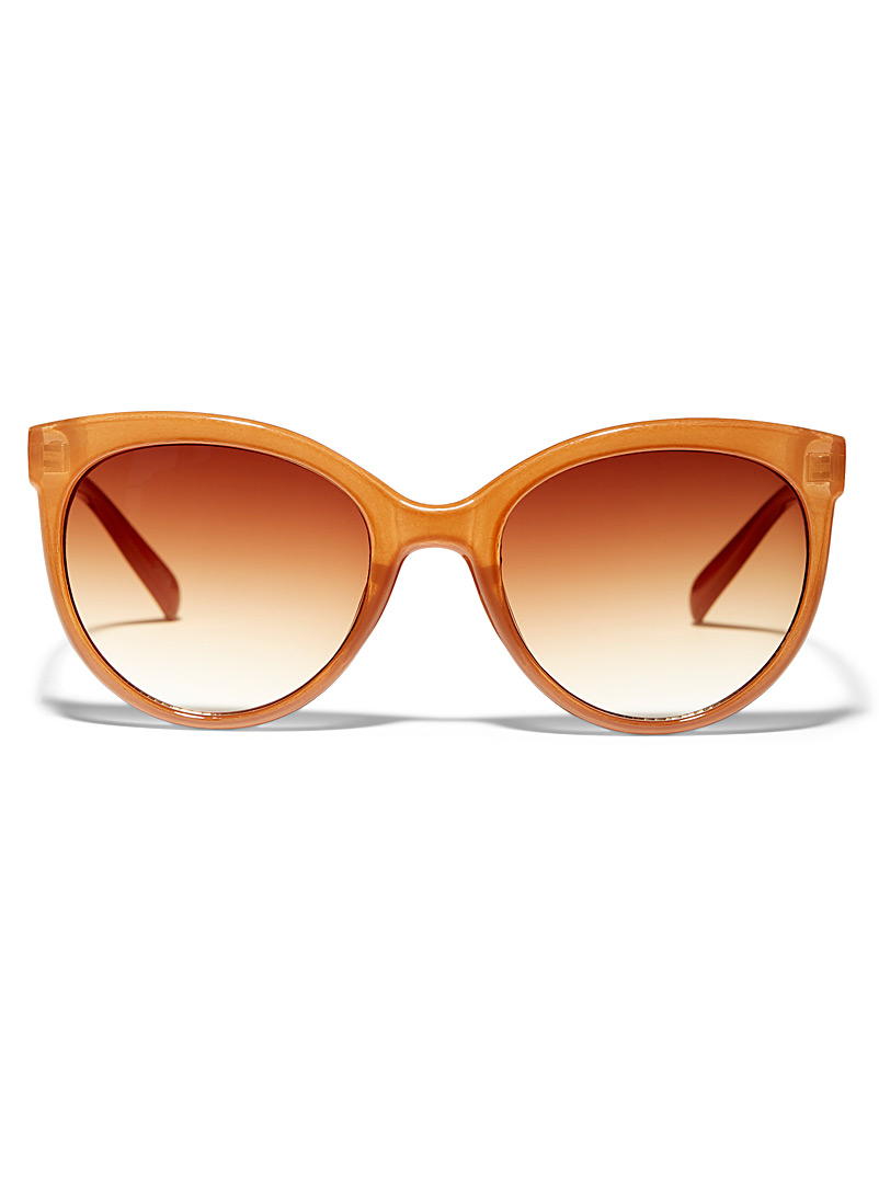 Simons: Les lunettes de soleil rondes branches contraste Bronze - Ambre pour femme