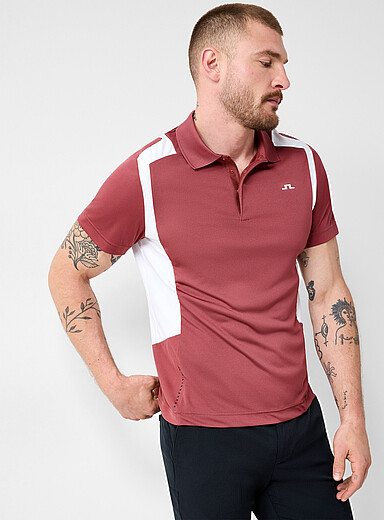 J.Lindeberg: Le polo de golf terracotta bandes respirantes Tangerine pour 