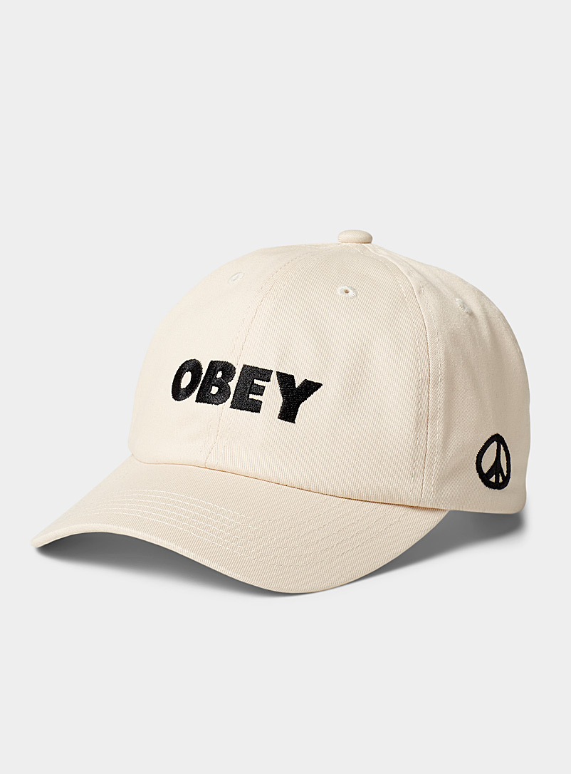 Obey: La casquette baseball denim logo brodé Ivoire blanc os pour femme