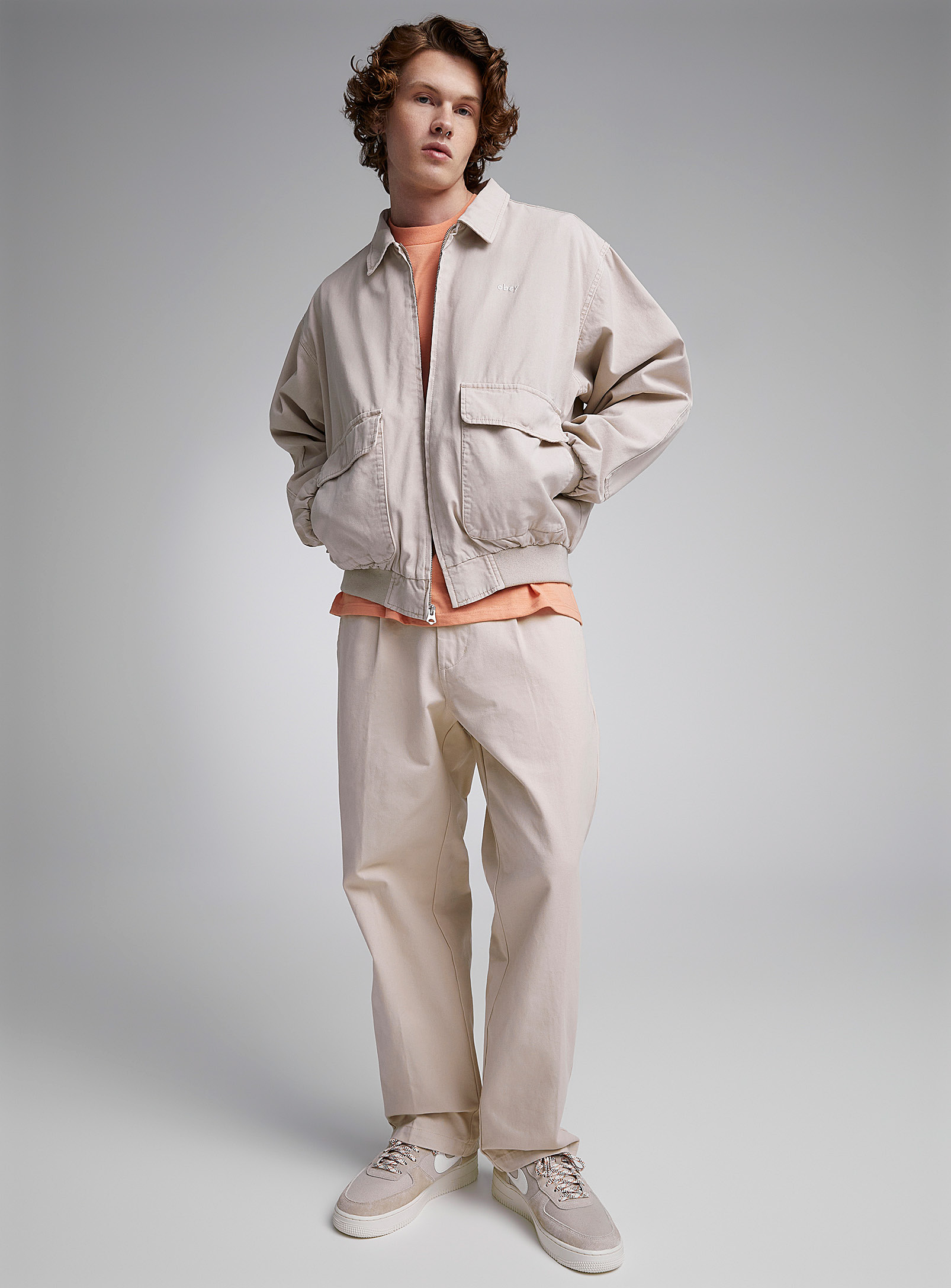 Obey Estate Pleated Chinos Relaxed Fit In Cream Beige