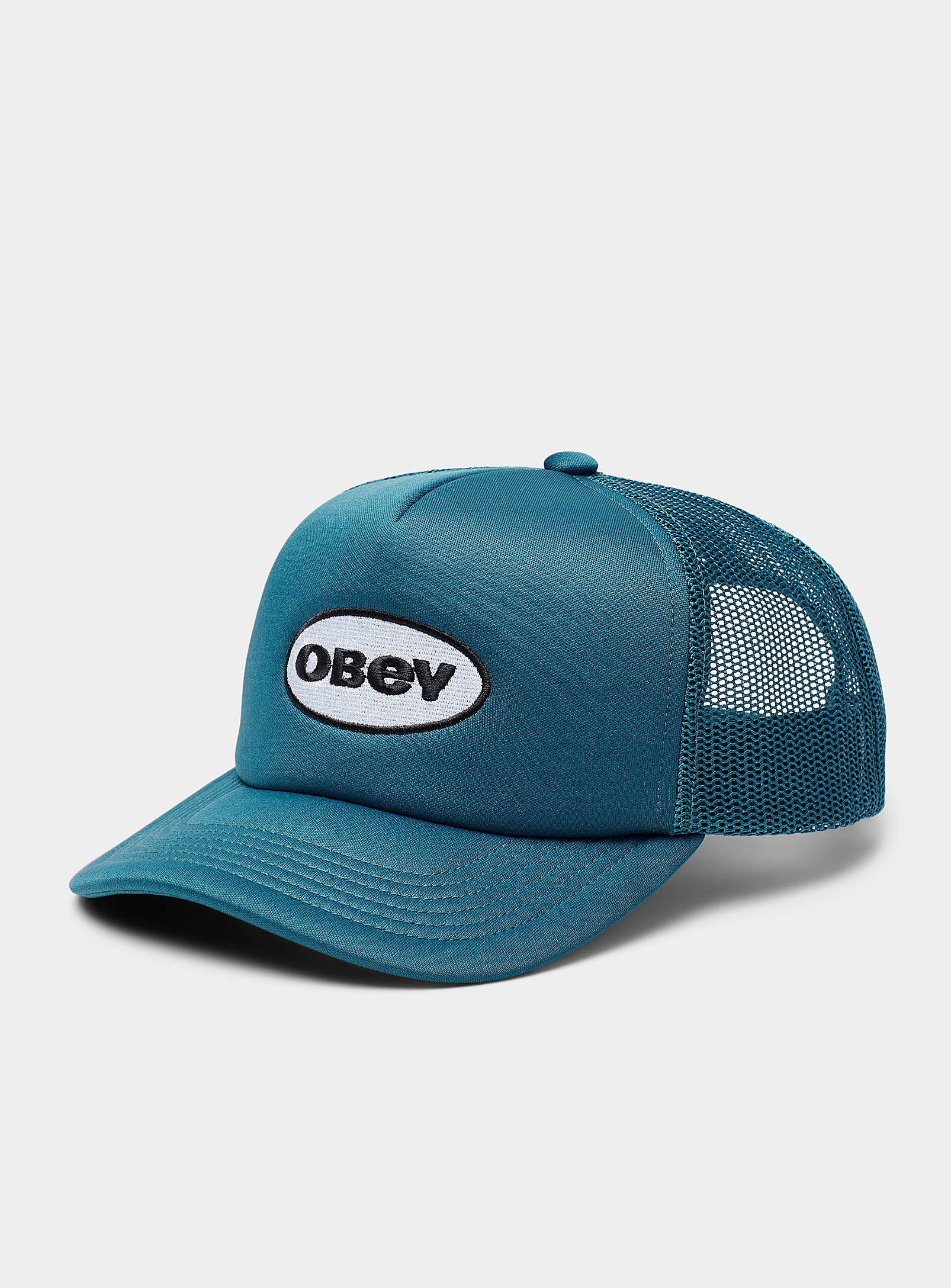 Obey Oval Logo Trucker Cap In Blue