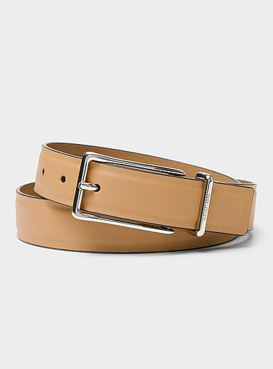 Elongated metallic buckle leather belt