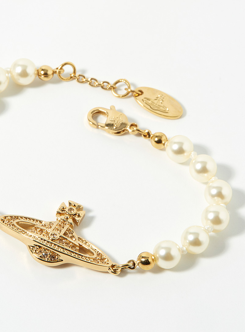 Vivienne Westwood: Le bracelet mini bas relief Jaune dor&eacute; pour femme