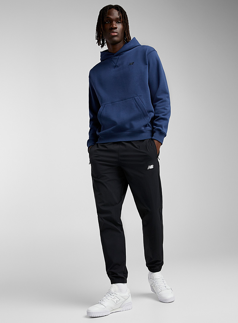 New Balance: Le jogger survêtement logo brodé Noir pour homme