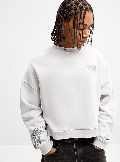 New Balance Grey Athletics cropped fleece sweatshirt <b>Slightly cropped oversized fit</b> for men