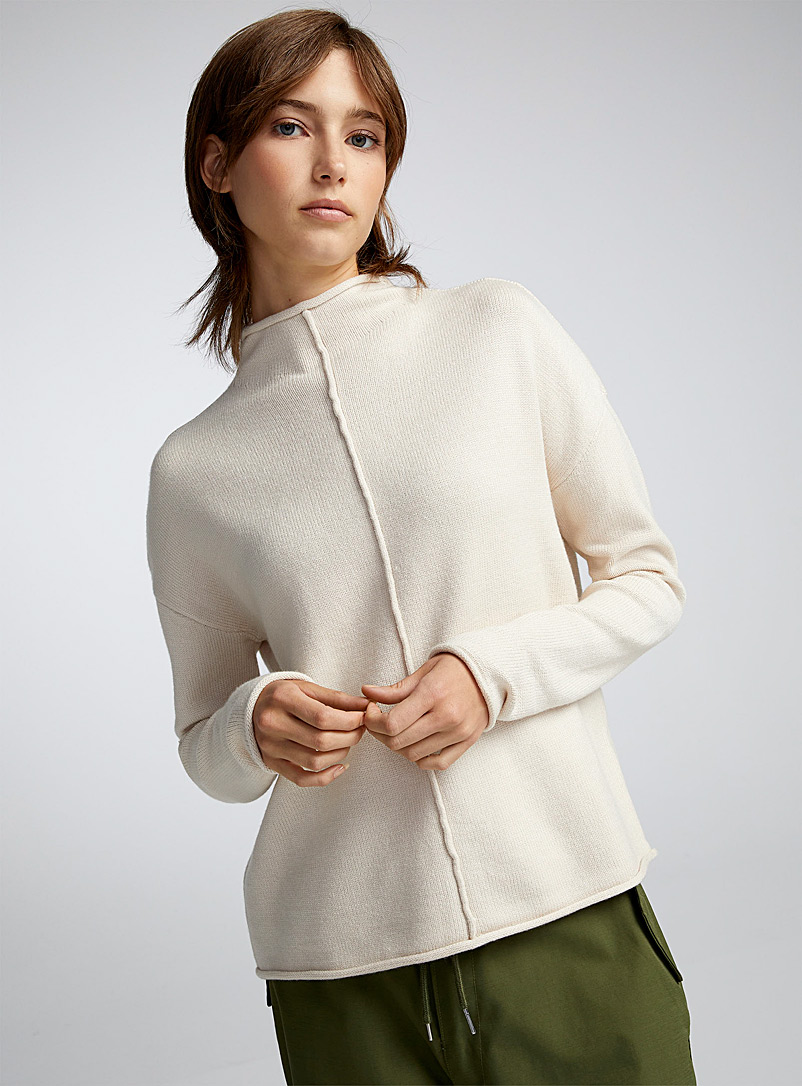 Twik Ivory White Reverse seam mock neck sweater for women
