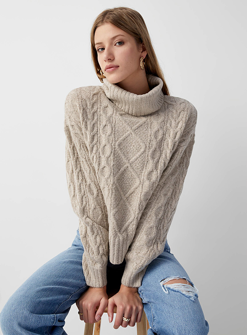 Twik Cream Beige Twisted cables loose turtleneck for women