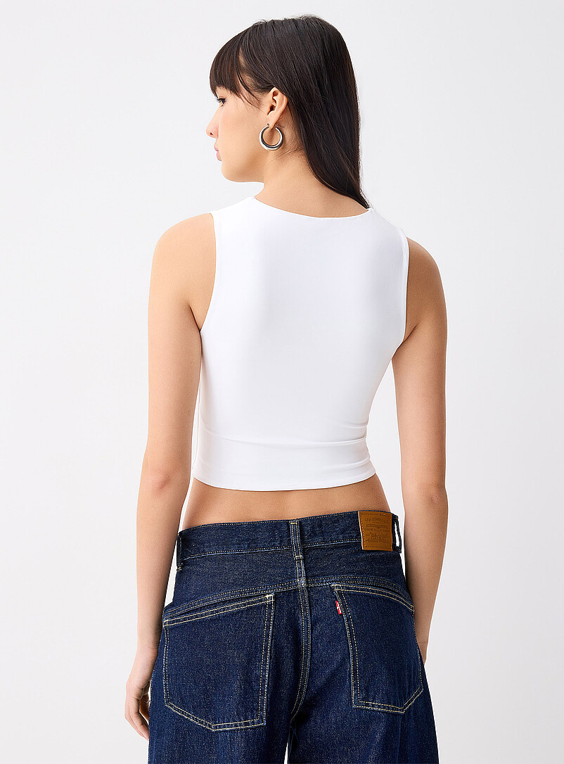 Twik: La camisole courte seconde peau Noir pour femme