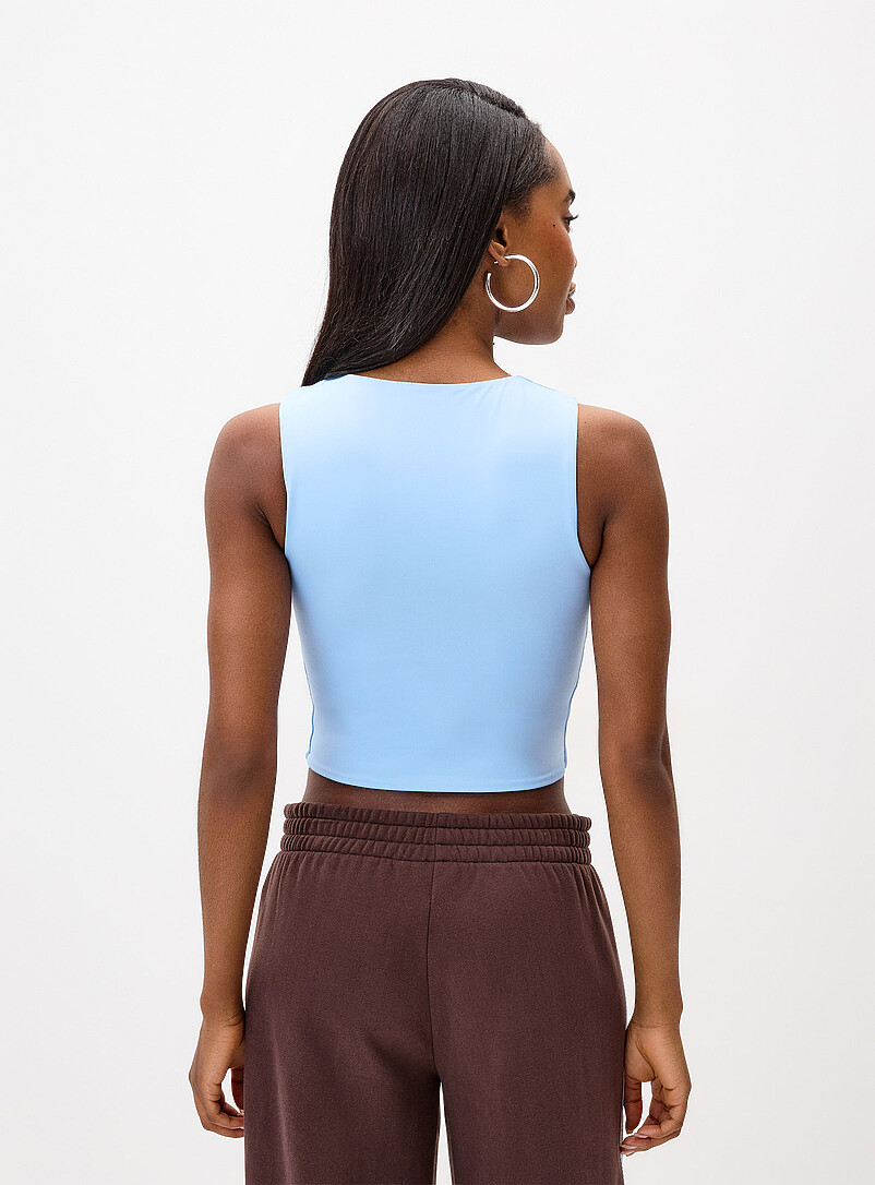 Twik: La camisole courte seconde peau Noir pour femme