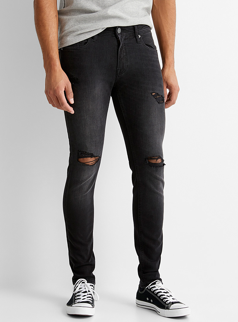 faded black distressed jeans