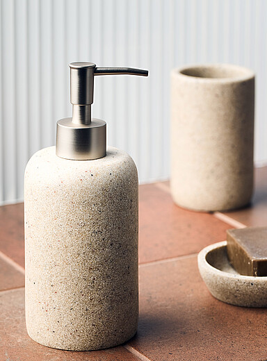 Sand-coloured soap dispenser