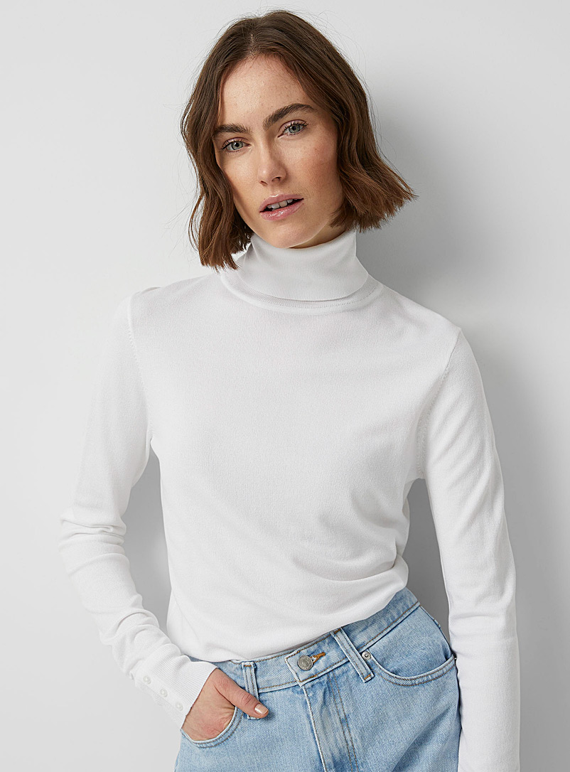Contemporaine: Le col roulé fin tricot poignets boutonnés Blanc pour femme