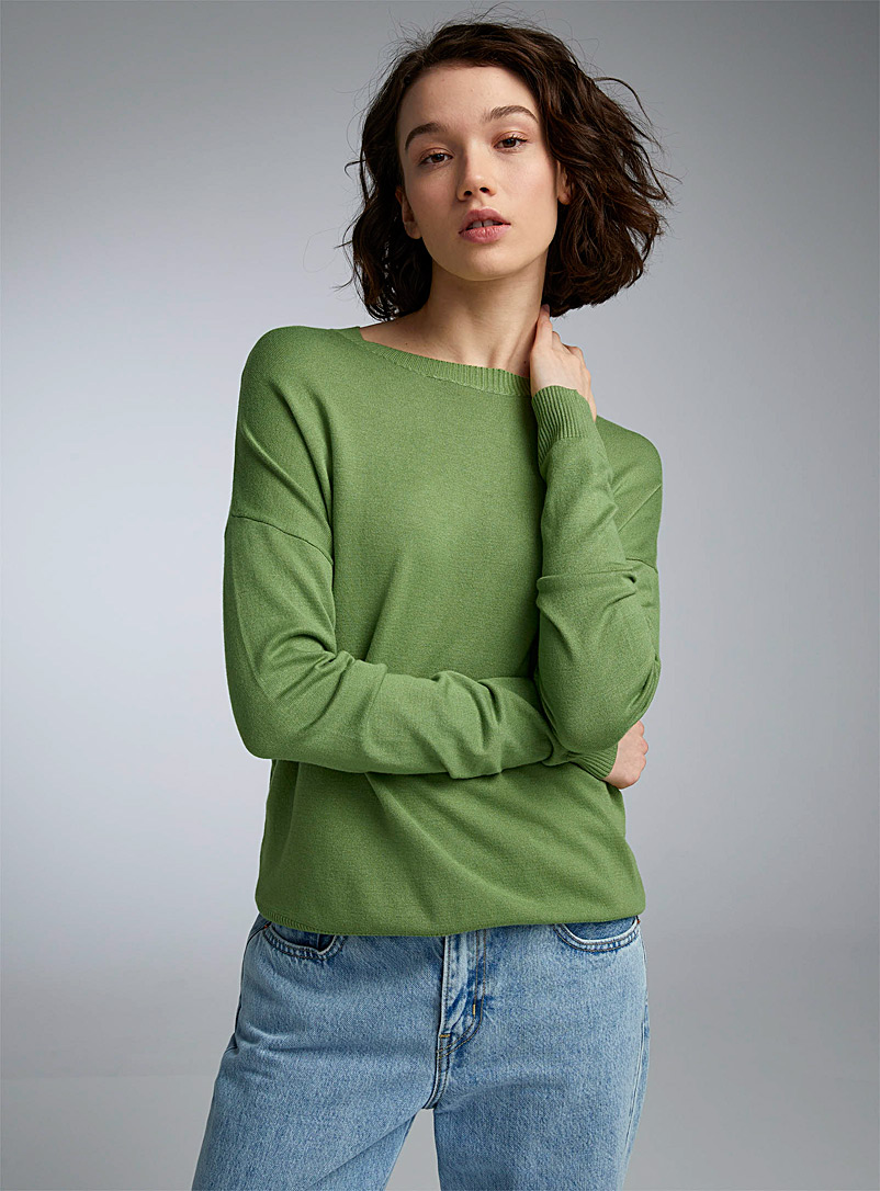 Twik: Le chandail ample uni Vert pour femme