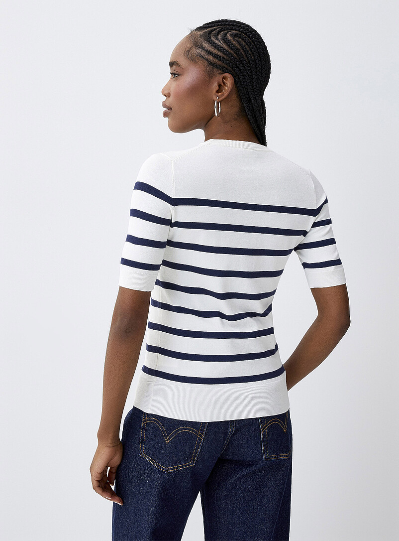 Twik: Le chandail fin tricot manches courtes Blanc &agrave; motifs pour femme