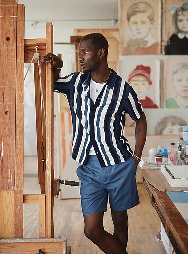 Striped pointelle-knit polo-collar cardigan
