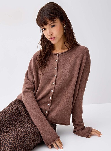 Le cardigan bords roulott&eacute;s