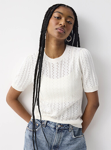 Le chandail tricot pointelle manches bouffantes
