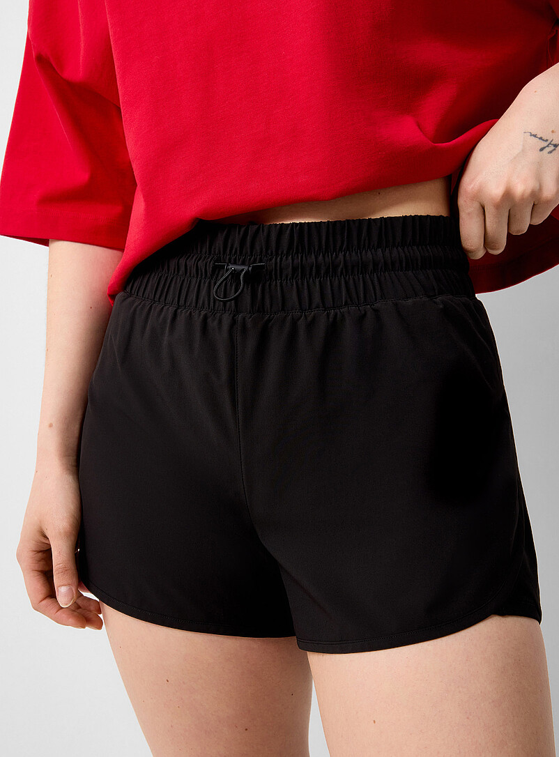 I.FIV5: Le short ourlets fendus Longueur 4" Orange pour femme