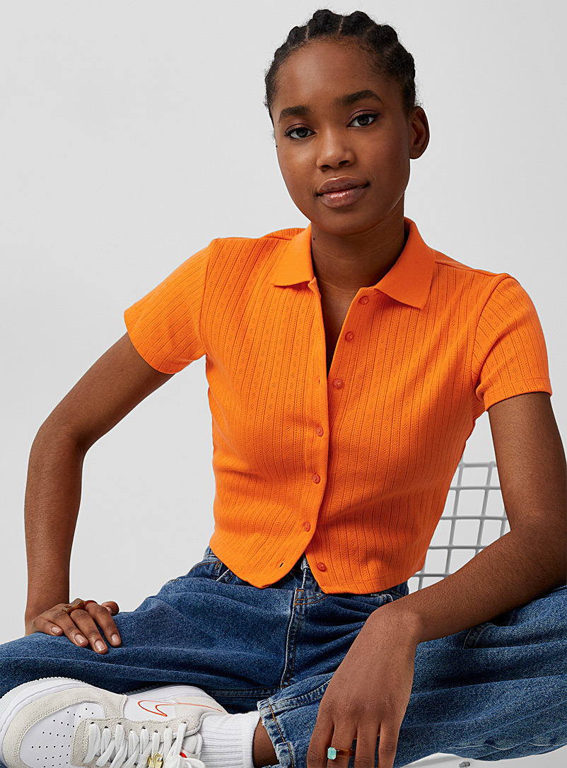 Twik: Le polo court motif pointelle coton bio Orange pour femme