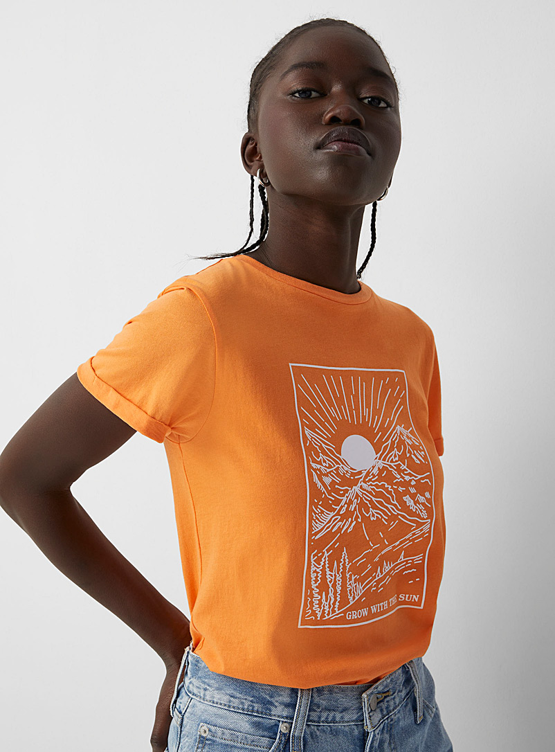 Twik: Le t-shirt col rond imprimé coton bio Orange pâle pour femme