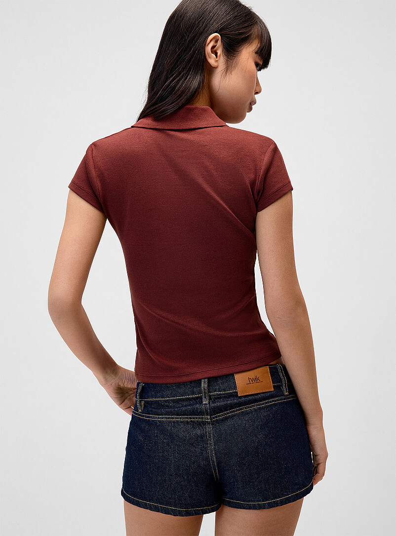 Twik: Le polo ajust&eacute; uni Noir pour femme