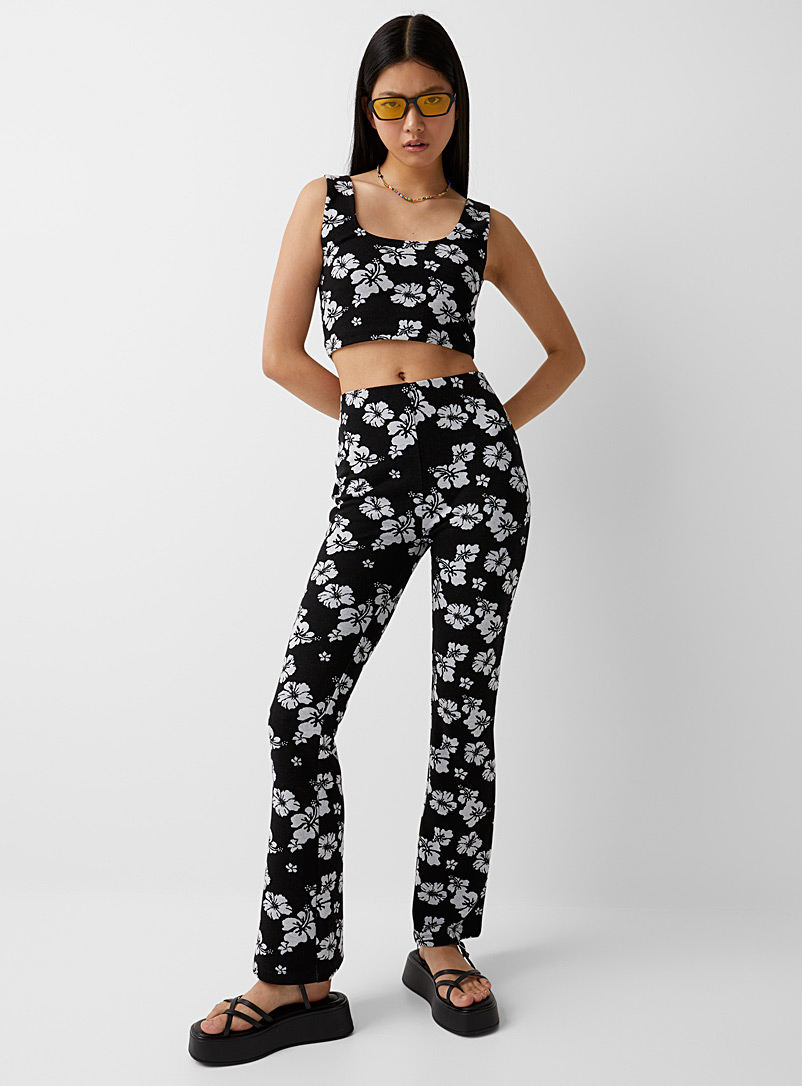 Twik Black and White Patterned knit flared pant for women