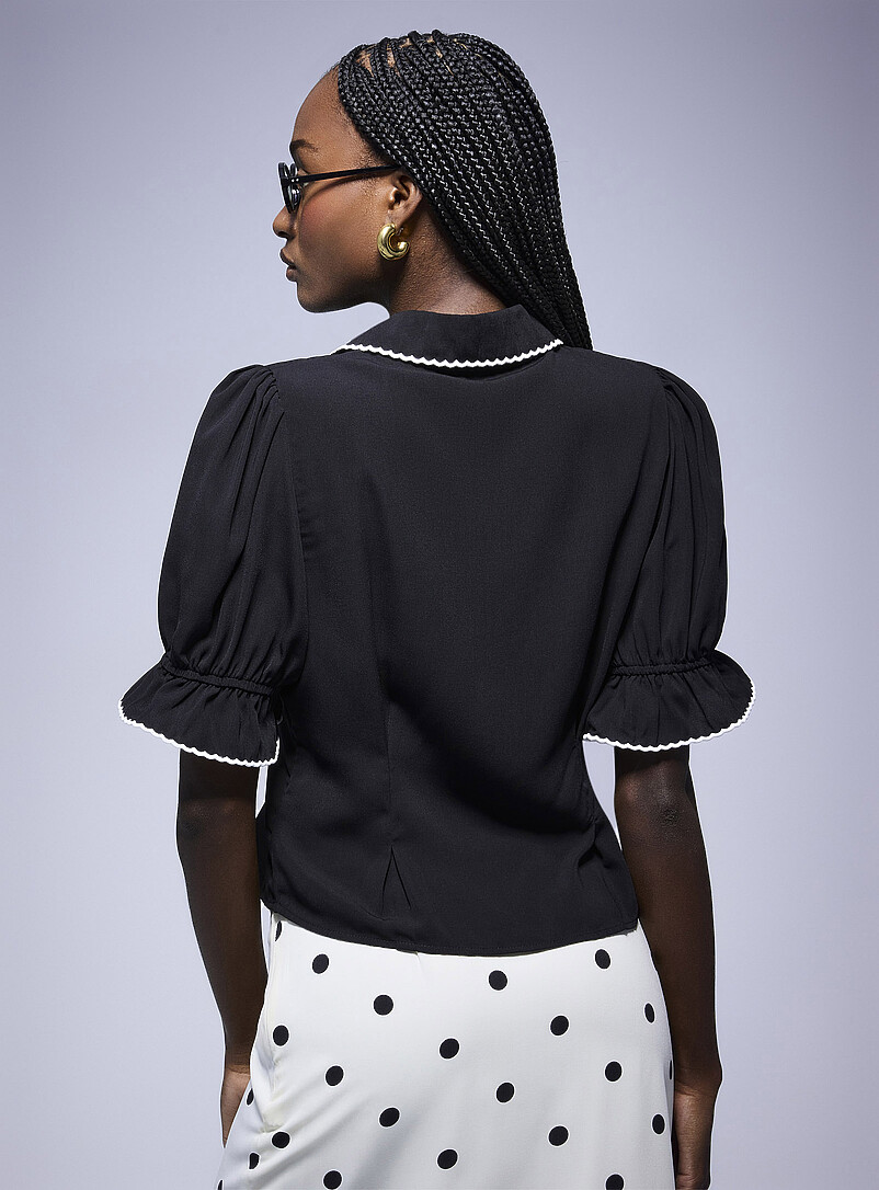 Ic&ocirc;ne: La blouse manches bouffantes lis&eacute;r&eacute; festonn&eacute; Noir pour femme