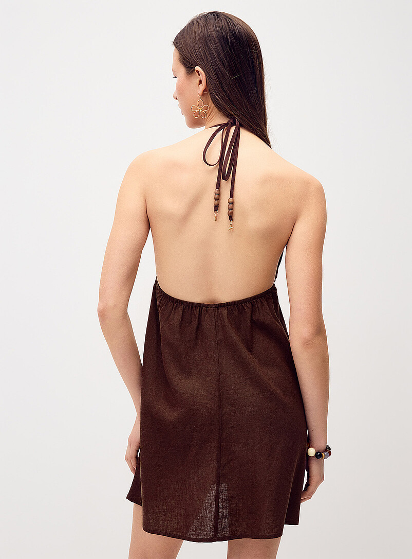 Twik: La minirobe bretelles licou billes Noir pour femme