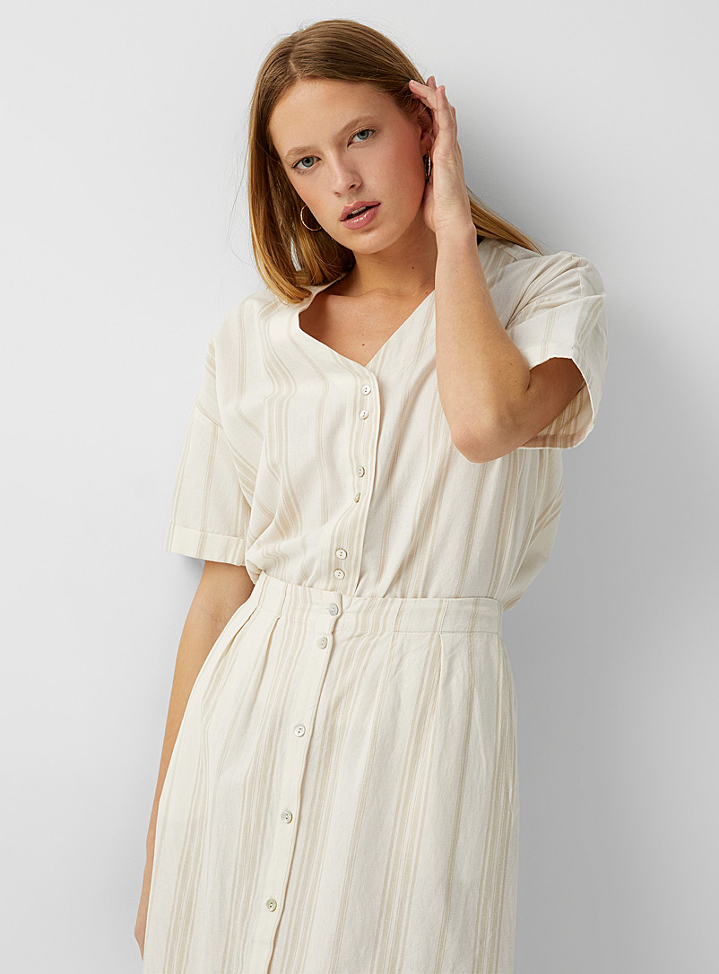 Icône: La blouse boutonnée touche de lin Blanc à motifs pour femme