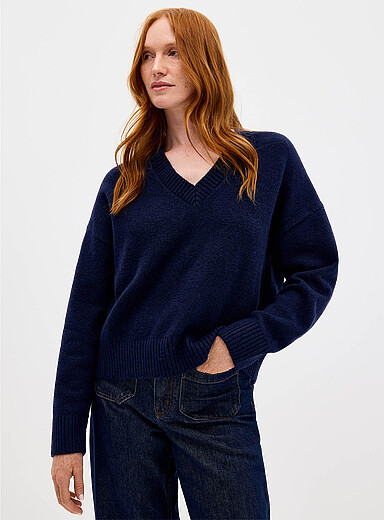 Loose fuzzy V-neck sweater