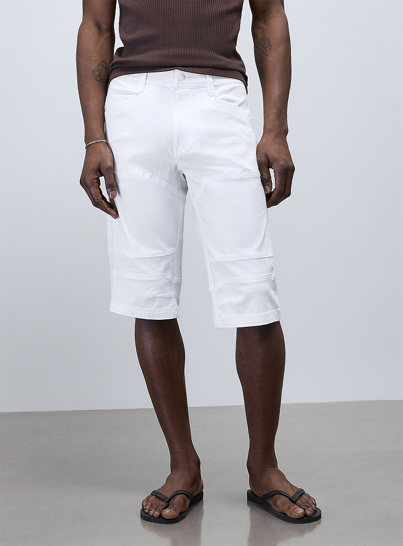 Projek Raw: Le bermuda toile extensible Noir pour homme