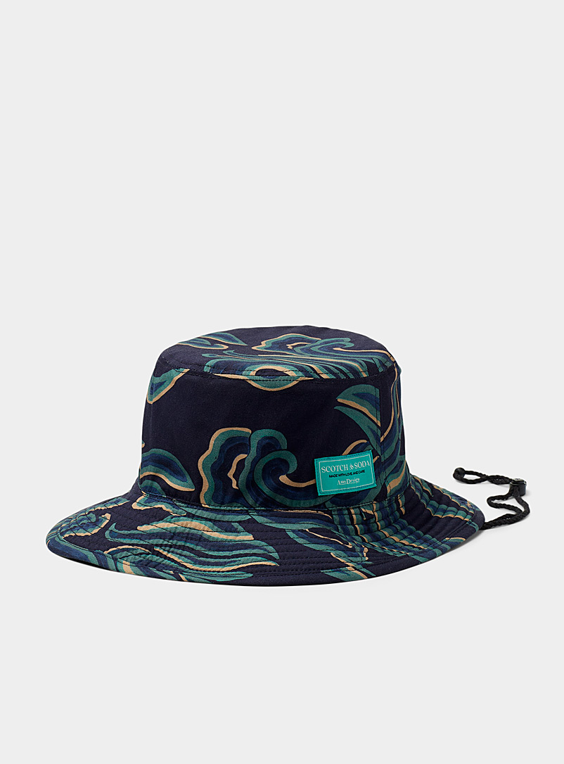 Reversible abstract foliage bucket hat