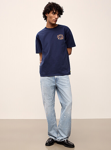 The Beat faded stained blue jean <b>Bootcut fit</b>
