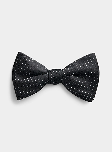 Le n&oelig;ud papillon petits pois blancs