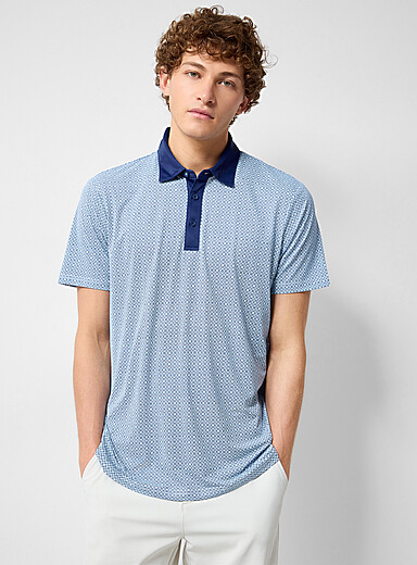 Le polo de golf motif m&eacute;daillons toucher soyeux