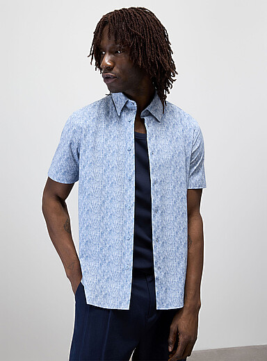 La chemise &eacute;pur&eacute;e toile extensible <b>Coupe r&eacute;guli&egrave;re</b>