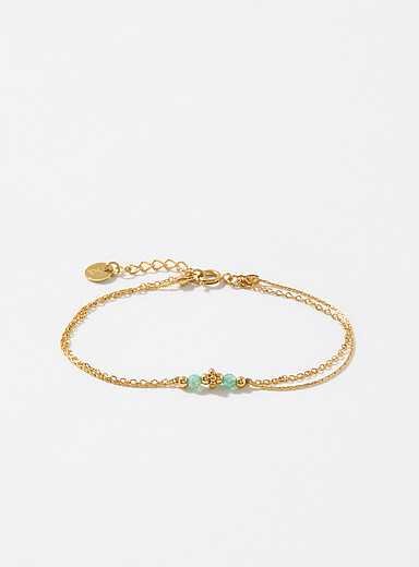 Le bracelet double cha&icirc;nette avec billes facett&eacute;es 