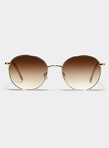 Les lunettes de soleil rondes Elly
