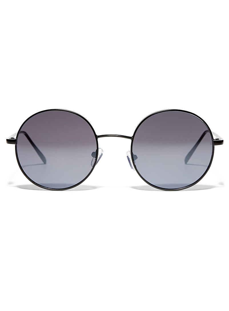 Simons: Les lunettes de soleil rondes Constance Noir pour femme
