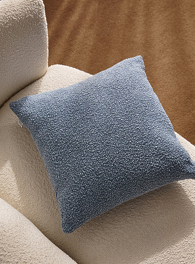 Le coussin d&eacute;houssable boucl&eacute; 50 x 50 cm