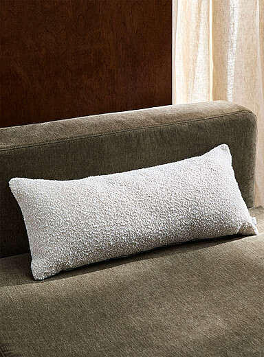 Ivory boucl&eacute; fabric removable-cover cushion 30 x 70 cm