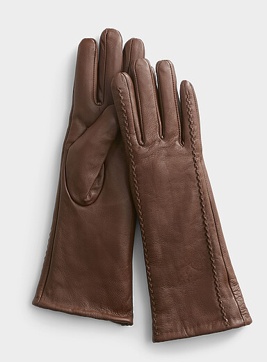 Le long gant cuir lisse d&eacute;tails tress&eacute;s