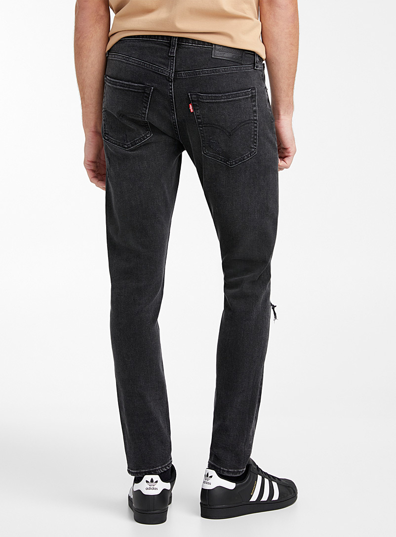 black distressed jeans levis