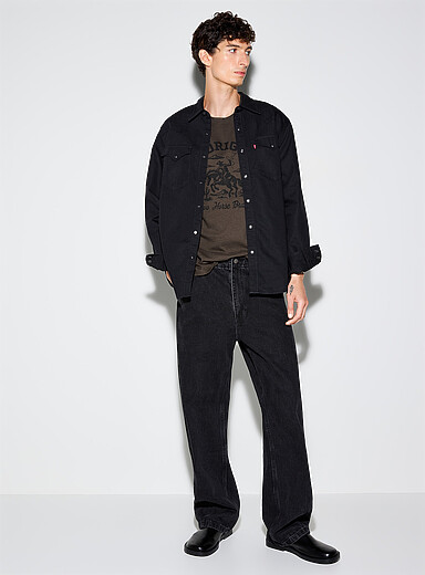Le jean noir d&eacute;lav&eacute; <b>Coupe tonneau tr&egrave;s ample</b>