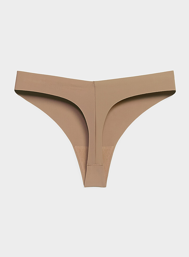 Miiyu: Le tanga dense coup&eacute; laser Nylon recycl&eacute; Beige pour femme