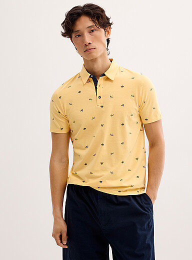 Le polo minimotifs sur rayures optiques <b>Coupe standard</b>