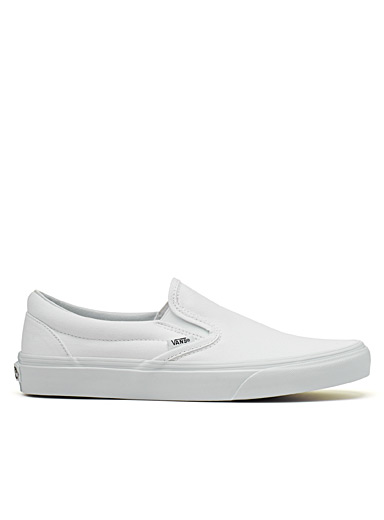 White Classic slip-ons Men | Vans | Sneakers & Running Shoes for Men ...