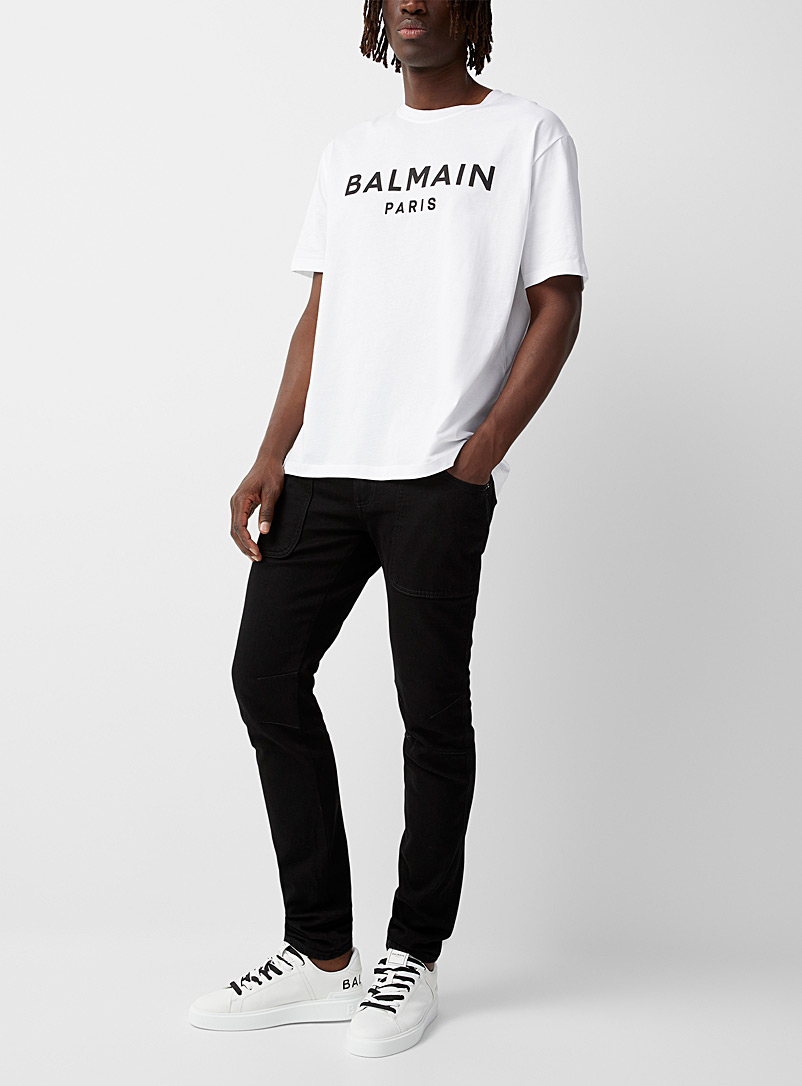 Balmain: Le jean noir poches plaquées Noir pour homme